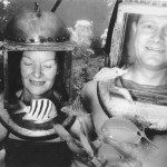 Early helmet diving couple.